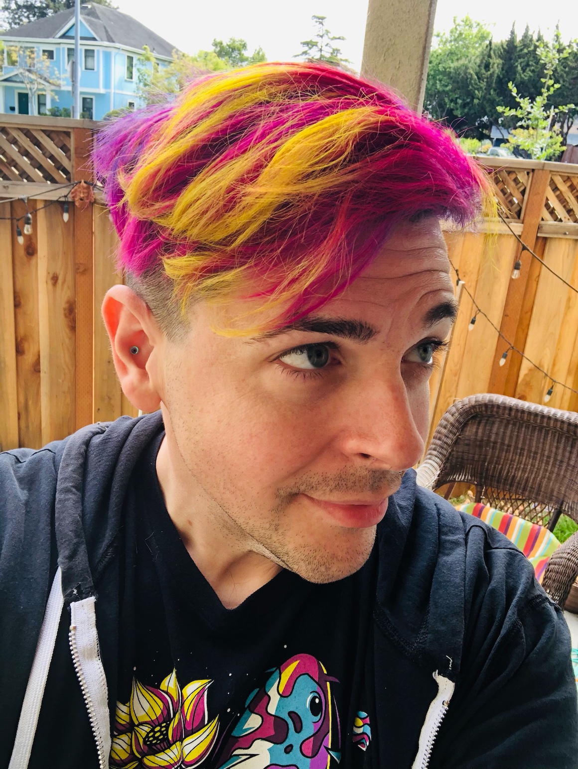 Photograph of Kevin Swiber at sunset with colorful hair.